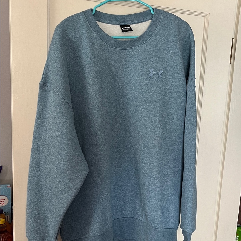 Woman’s oversized UA sweatshirt